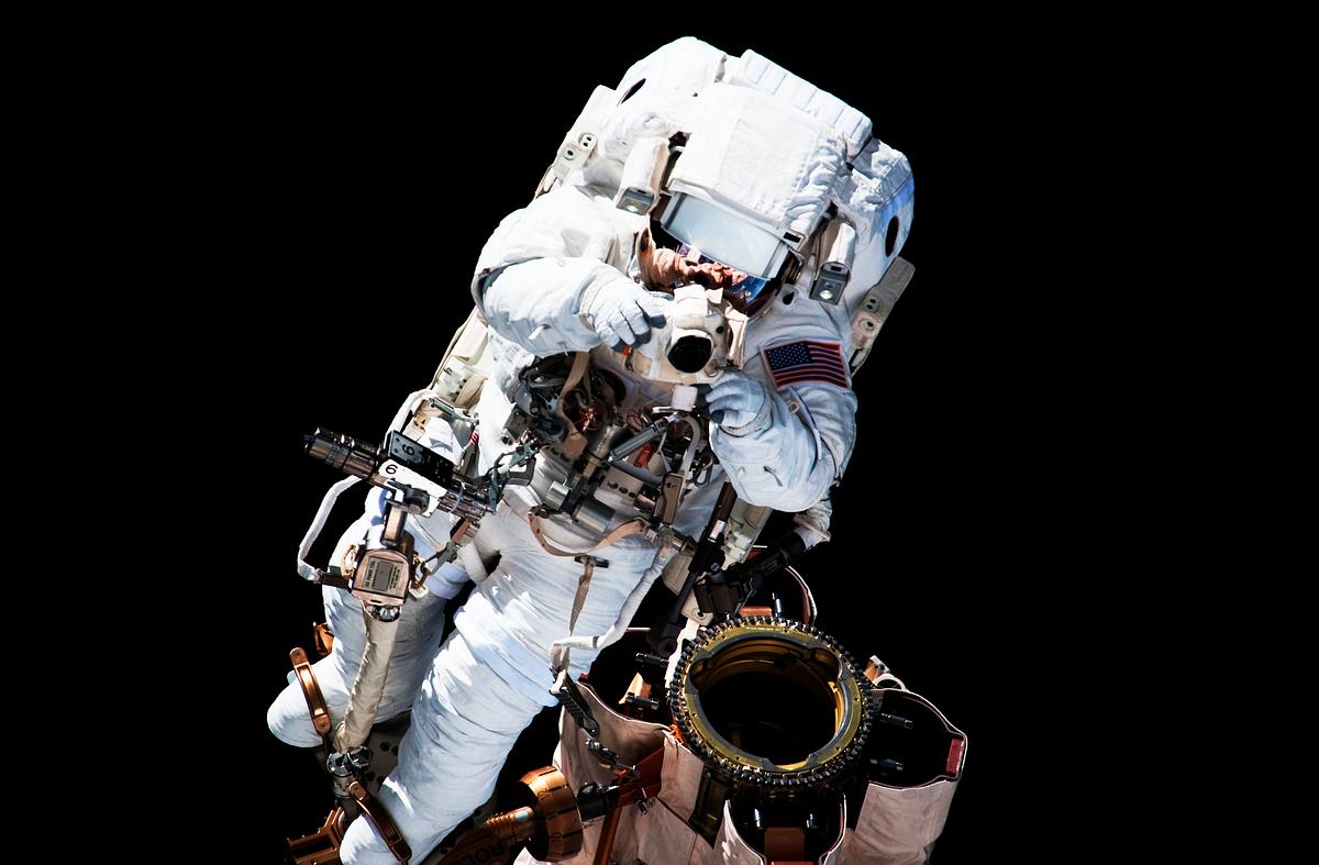 NASA astronaut Garrett Reisman during EVA 1.… | Free public domain photo NASA astronaut Garrett Reisman during EVA 1. Original from NASA. Digitally enhanced by rawpixel.
