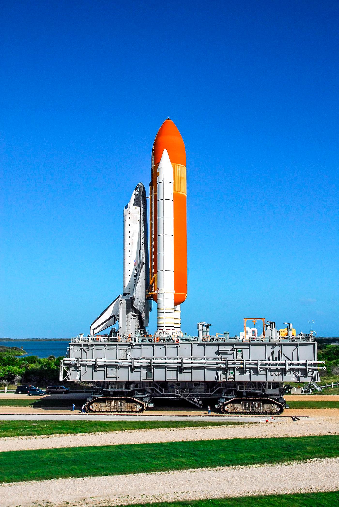 KENNEDY SPACE CENTER, FLA. -- The crawler transporter, moving Space Shuttle Discovery atop its mobile launch platform from... KENNEDY SPACE CENTER, FLA. -- The crawler transporter, moving Space Shuttle Discovery atop its mobile launch platform from...
