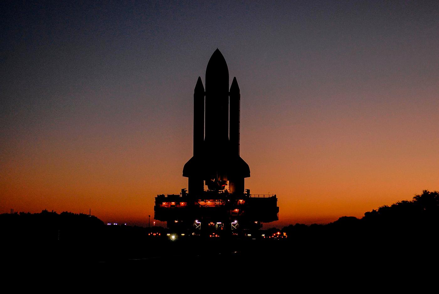 The Space Shuttle Atlantis, secured atop a mobile launch platform. Original from NASA. Digitally enhanced by rawpixel. The Space Shuttle Atlantis, secured atop a mobile launch platform. Original from NASA. Digitally enhanced by rawpixel.