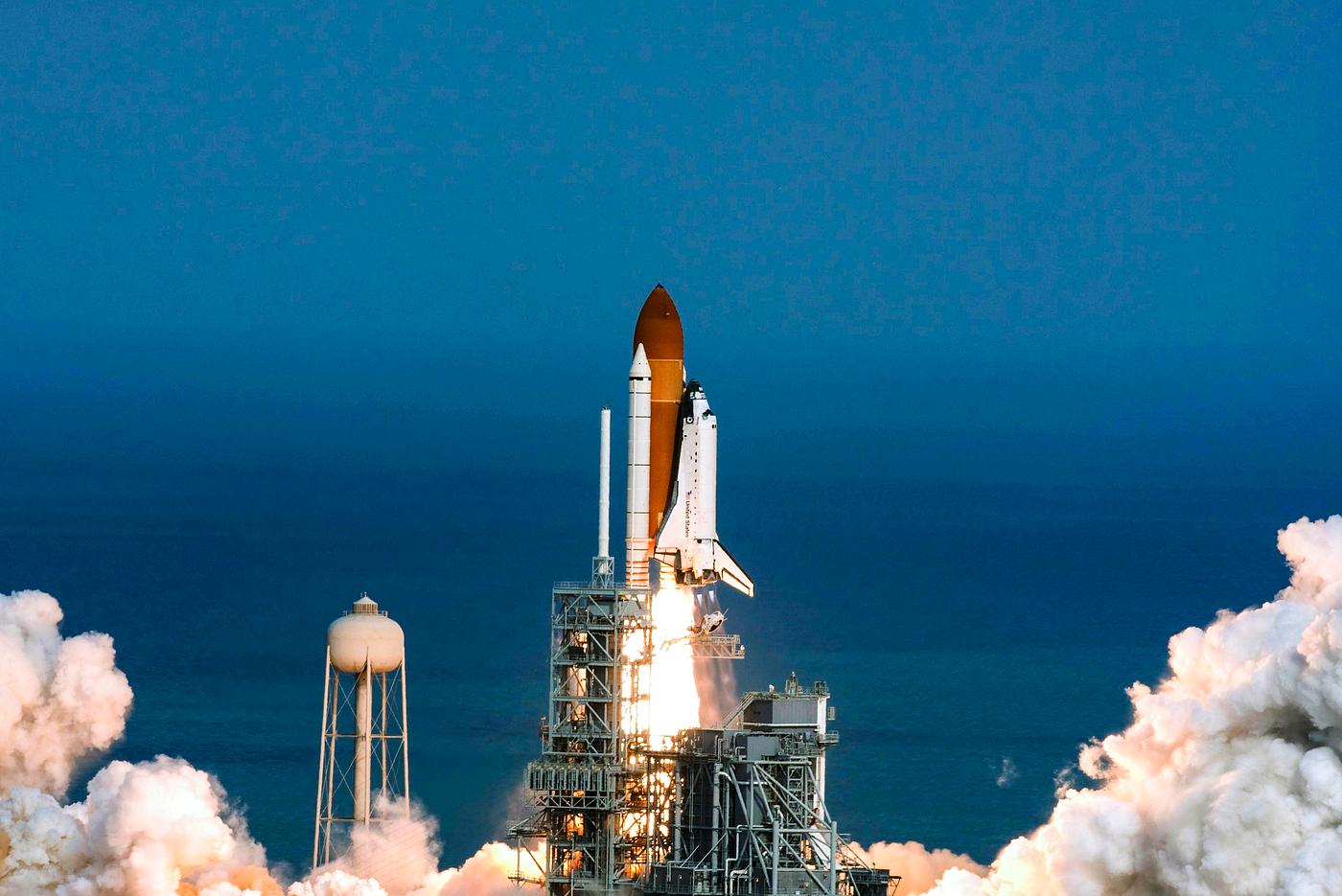 Space shuttle Atlantis and its four-member STS-135 crew head toward Earth orbit and rendezvous with the International Space... Space shuttle Atlantis and its four-member STS-135 crew head toward Earth orbit and rendezvous with the International Space...