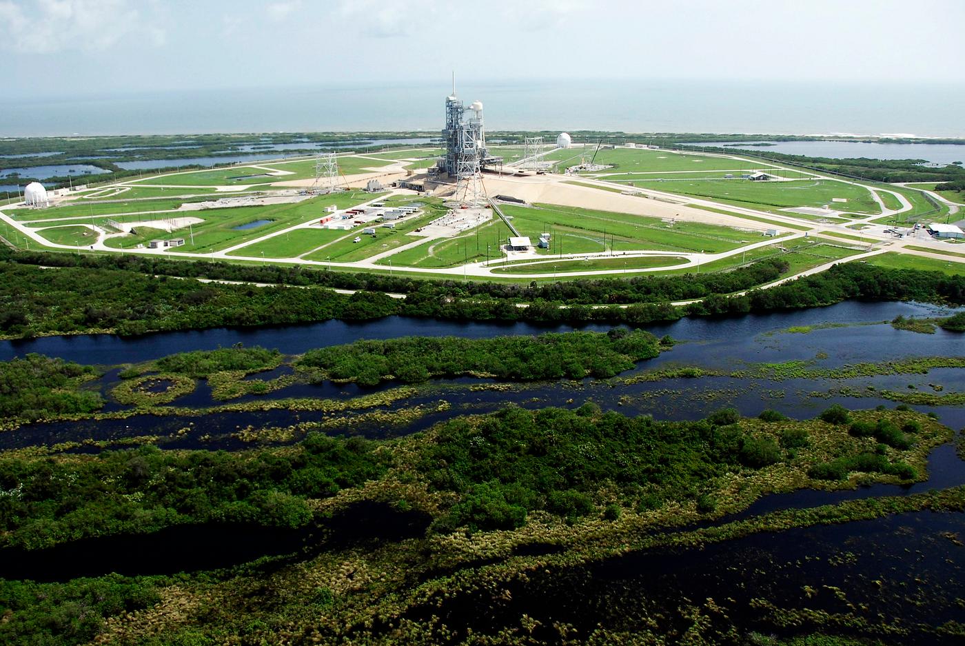 This aerial view shows the high water surrounding Launch Pad 39A at NASA's Kennedy Space Center following Tropical Storm... This aerial view shows the high water surrounding Launch Pad 39A at NASA's Kennedy Space Center following Tropical Storm...