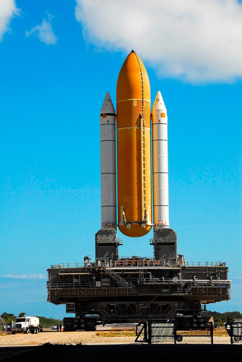 Space shuttle Atlantis external fuel tank… | Free public domain photo Space shuttle Atlantis external fuel tank-solid rocket booster stack, atop a mobile launcher platform. Original from NASA.…