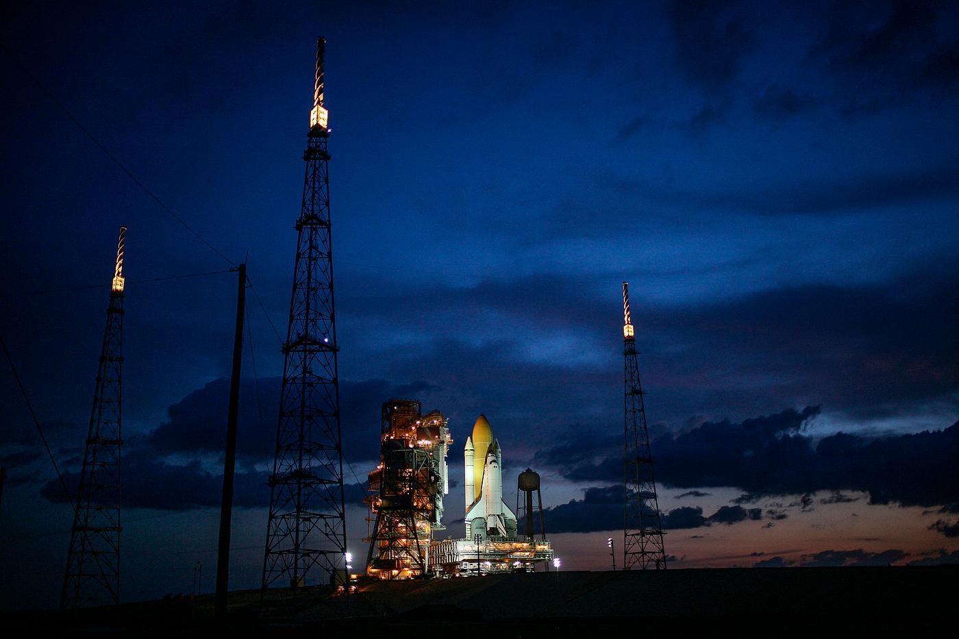 Just before dawn, space shuttle Endeavour is bathed in xenon lights after being secured on Launch Pad 39B. Original from... Just before dawn, space shuttle Endeavour is bathed in xenon lights after being secured on Launch Pad 39B. Original from...