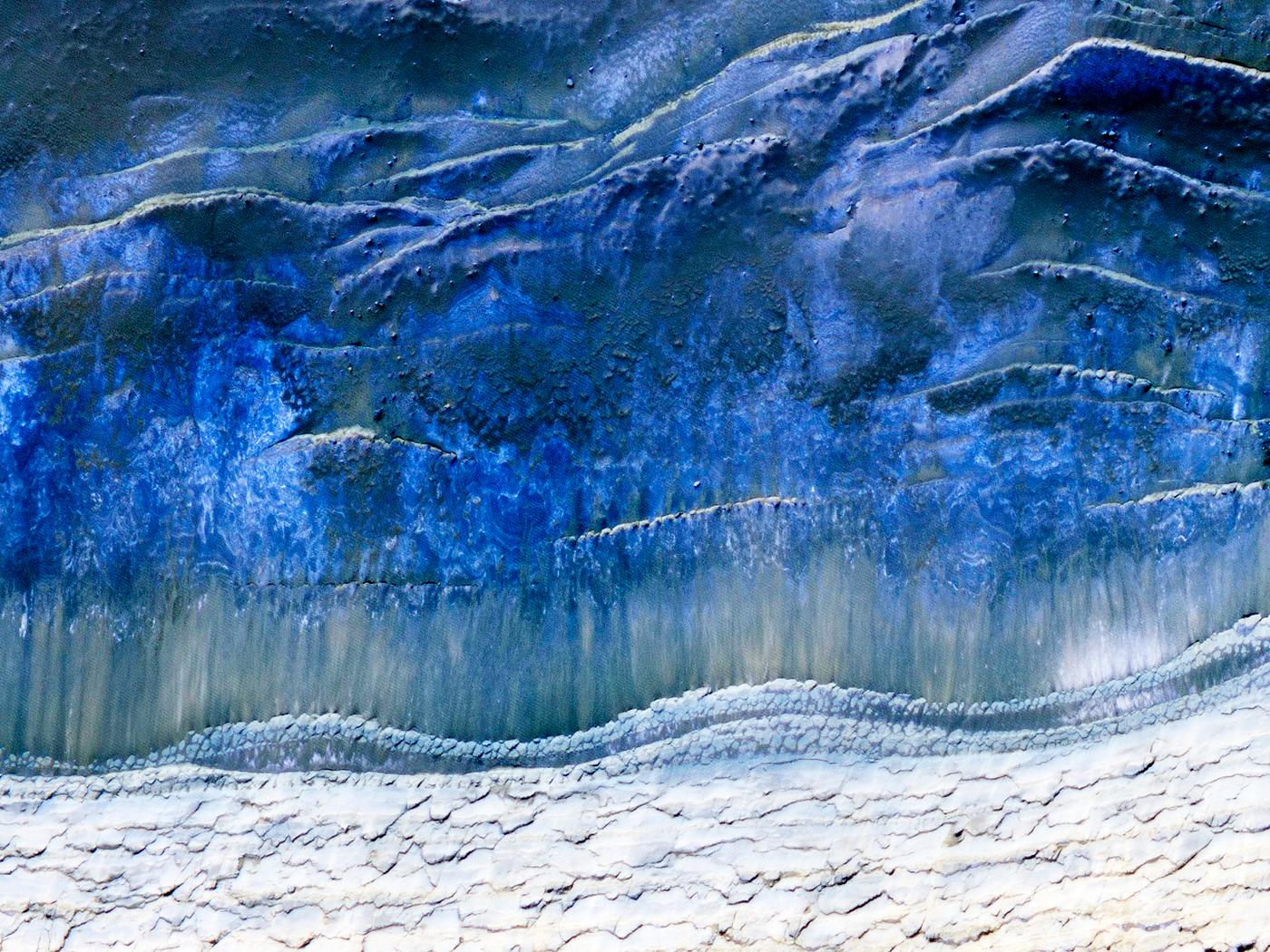 The scarp that demarcates the boundary between layered deposits covering the north polar region and the lower surrounding... The scarp that demarcates the boundary between layered deposits covering the north polar region and the lower surrounding...