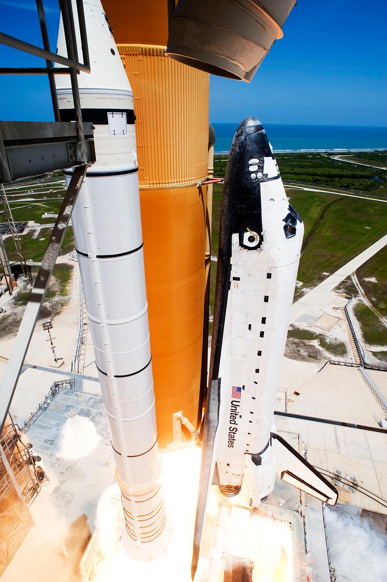 Space shuttle Atlantis and its four-member… | Free public domain photo Space shuttle Atlantis and its four-member STS-135 crew head toward Earth orbit and rendezvous with the International Space…