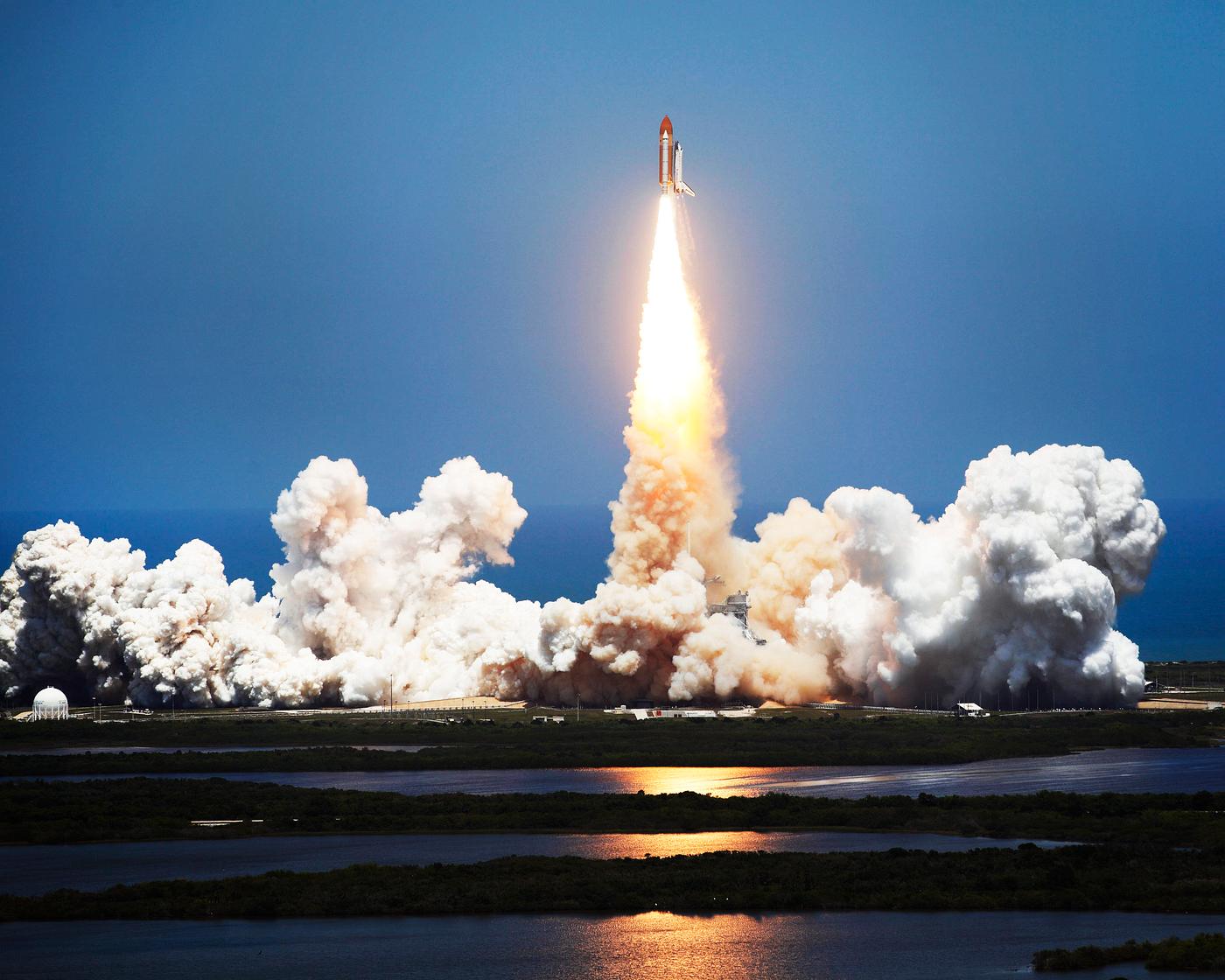 Space shuttle Atlantis and its four-member STS-135 crew head toward Earth orbit and rendezvous with the International Space... Space shuttle Atlantis and its four-member STS-135 crew head toward Earth orbit and rendezvous with the International Space...