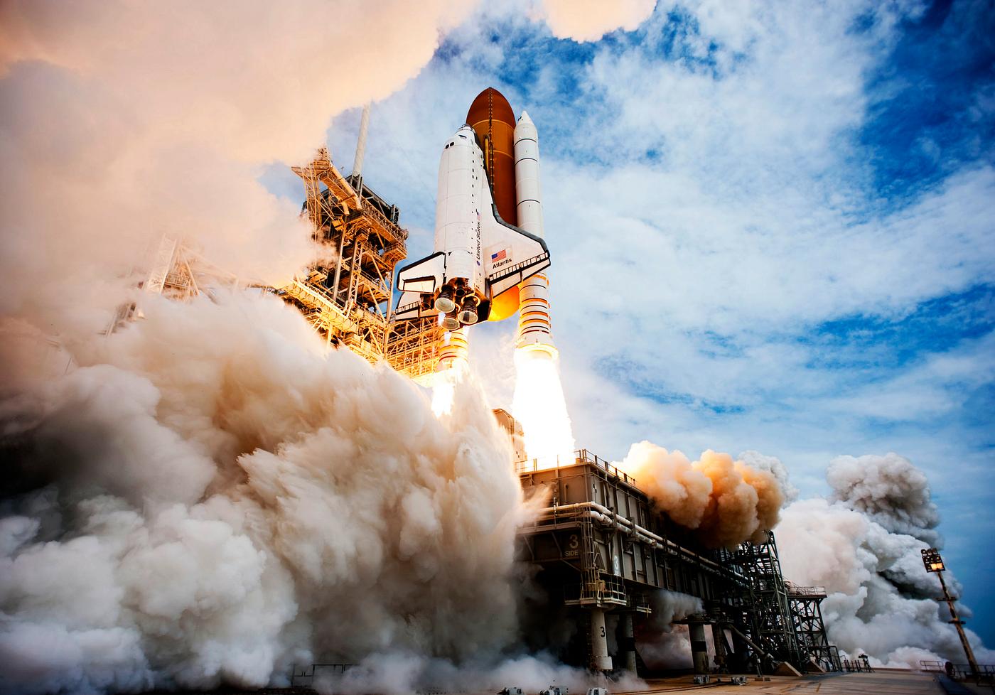 Space shuttle Atlantis and its four-member STS-135 crew head toward Earth orbit and rendezvous with the International Space... Space shuttle Atlantis and its four-member STS-135 crew head toward Earth orbit and rendezvous with the International Space...
