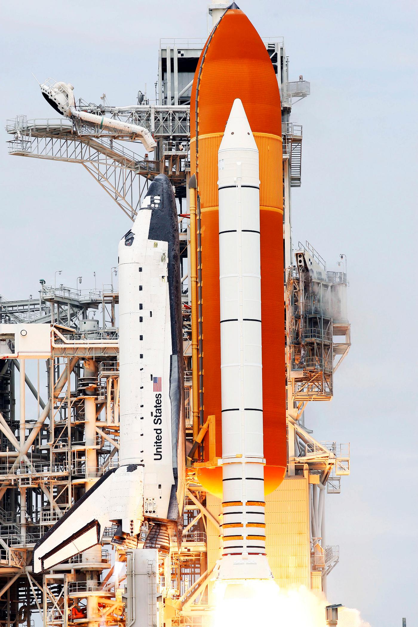 Space shuttle Atlantis and its four-member STS-135 crew head toward Earth orbit and rendezvous with the International Space... Space shuttle Atlantis and its four-member STS-135 crew head toward Earth orbit and rendezvous with the International Space...