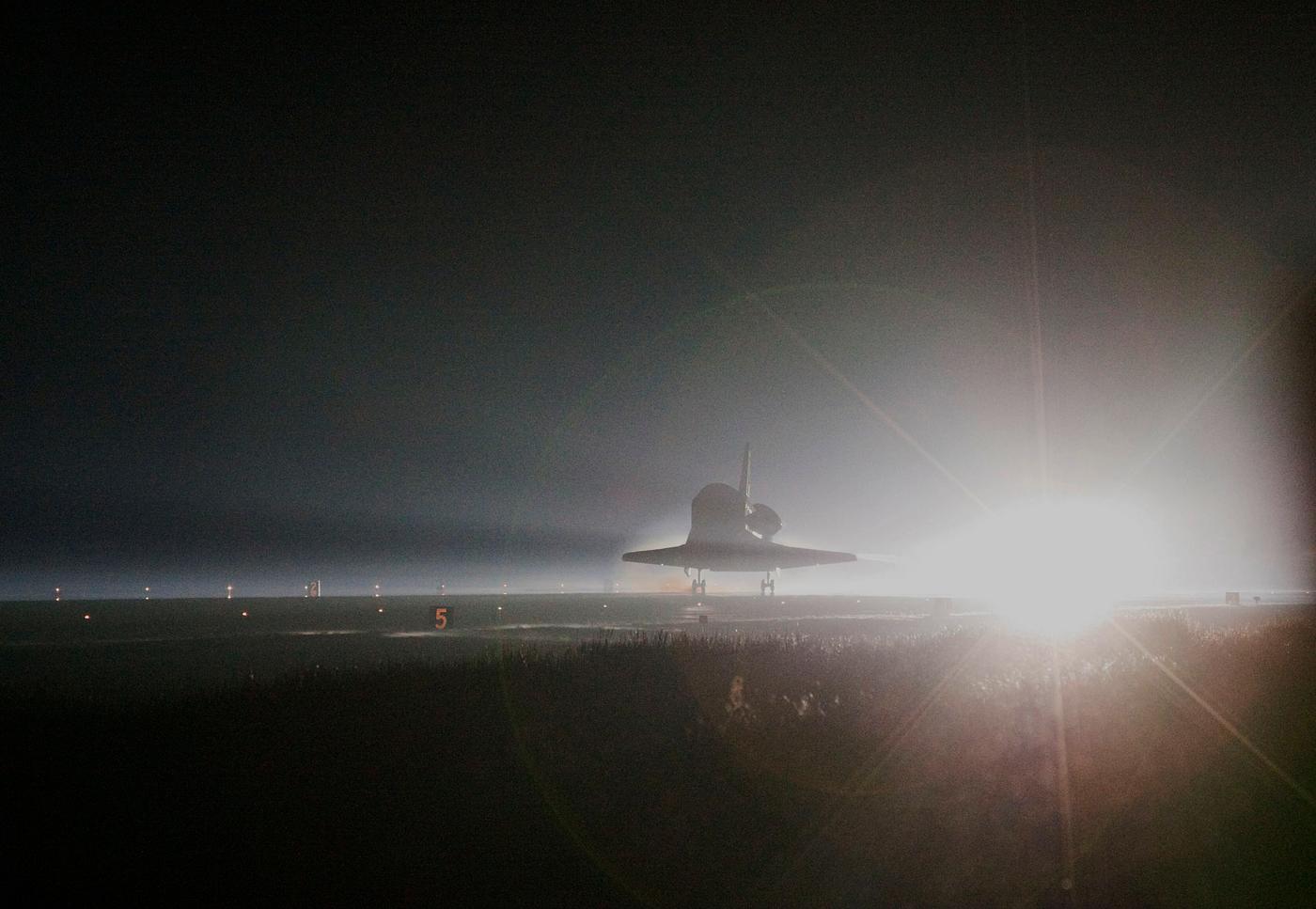 Atlantis nears touchdown for the final time on Runway 15 at the Shuttle Landing Facility at NASA's Kennedy Space Center... Atlantis nears touchdown for the final time on Runway 15 at the Shuttle Landing Facility at NASA's Kennedy Space Center...