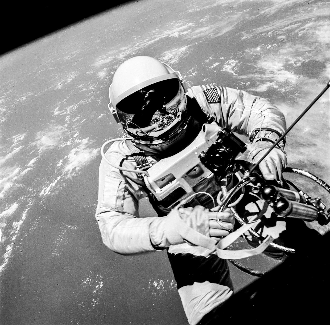 Astronaut Edward H. White II, pilot on the Gemini-Titan IV (GT-4) spaceflight, floats in the zero gravity of space outside... Astronaut Edward H. White II, pilot on the Gemini-Titan IV (GT-4) spaceflight, floats in the zero gravity of space outside...