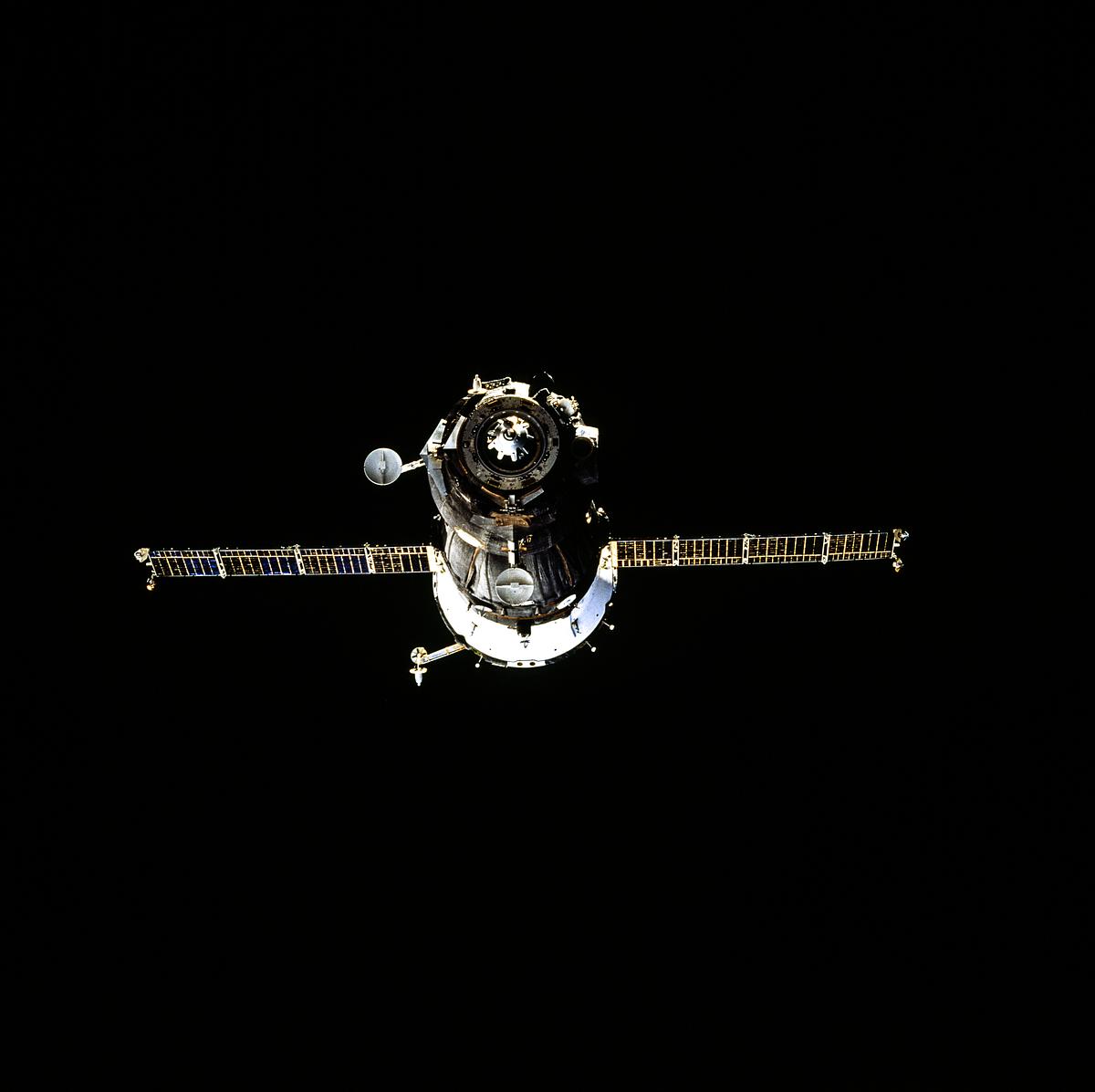 Russia's Soyuz spacecraft is backdropped… | Free public domain photo Russia's Soyuz spacecraft is backdropped against the darkness of space. Original from NASA. Digitally enhanced by rawpixel.