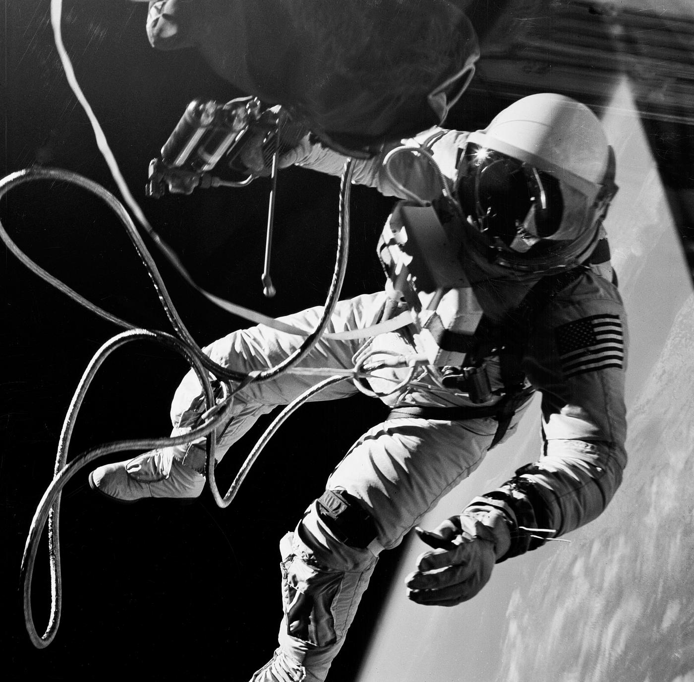 Astronaut Edward H. White II, pilot on the Gemini-Titan IV (GT-4) spaceflight, floats in the zero gravity of space outside... Astronaut Edward H. White II, pilot on the Gemini-Titan IV (GT-4) spaceflight, floats in the zero gravity of space outside...