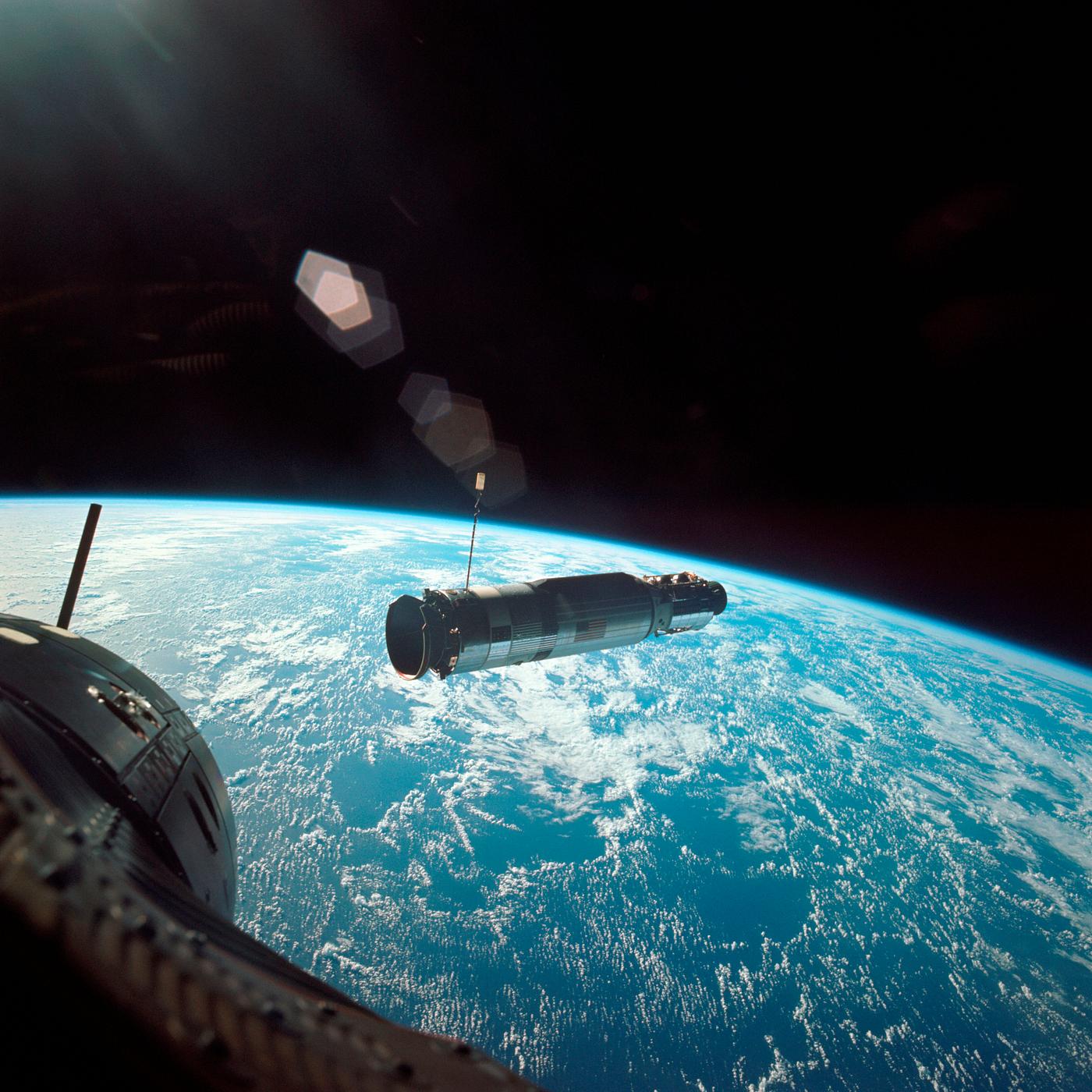 Agena Target Docking Vehicle 5005 is photographed from the Gemini-Titan 10. Original from NASA. Digitally enhanced by... Agena Target Docking Vehicle 5005 is photographed from the Gemini-Titan 10. Original from NASA. Digitally enhanced by...