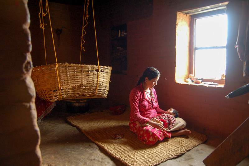 A Nepalese Mother and Her Infant. Original image sourced from US Government department: Public Health Image Library, Centers…