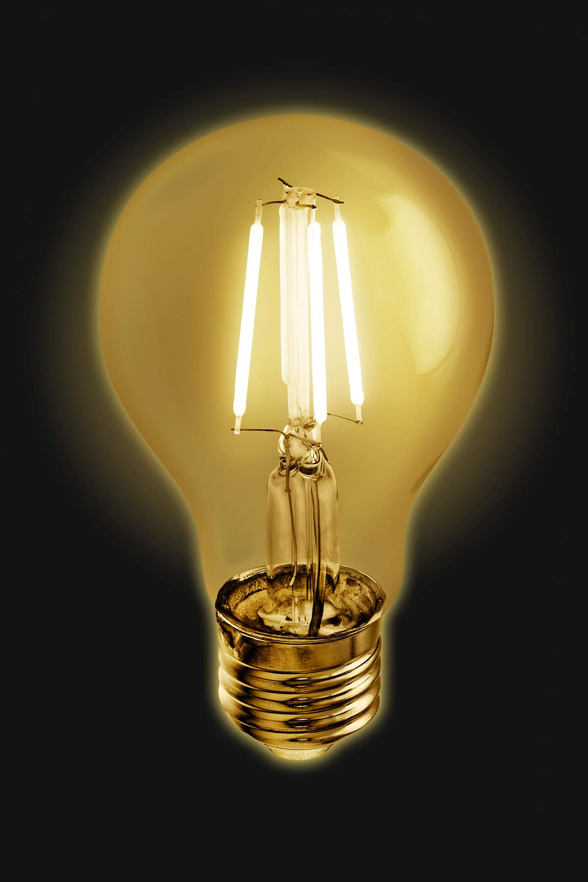 Download Edison Light Bulb On A Black Background
