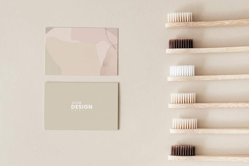 Download Bamboo toothbrushes and design card mockup
