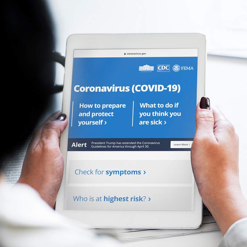 Woman reading coronavirus information from a… | Free stock photo | High Resolution image Woman reading coronavirus information from a tablet mockup with editorial graphic from https://www.coronavirus.gov/ accessed…