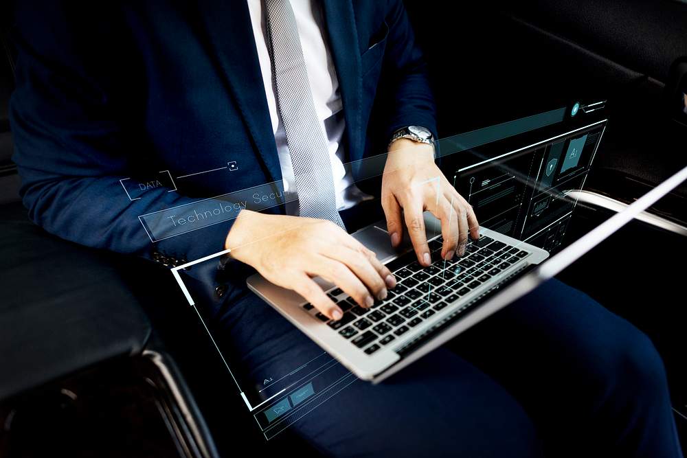 How to Succeed as a Programmer
Businessman using his laptop in a car