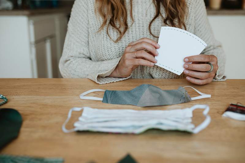 Woman making a diy face mask during the coronavirus pandemic