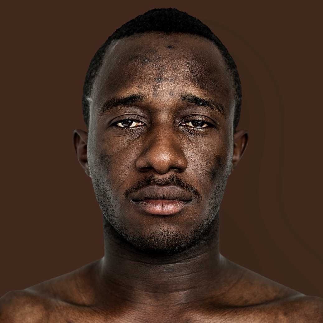 Portrait of a Ghanaian man Portrait of a Ghanaian man - adult, african, african descent, alone, beard, black, closeup, expression, face, faces, focus…