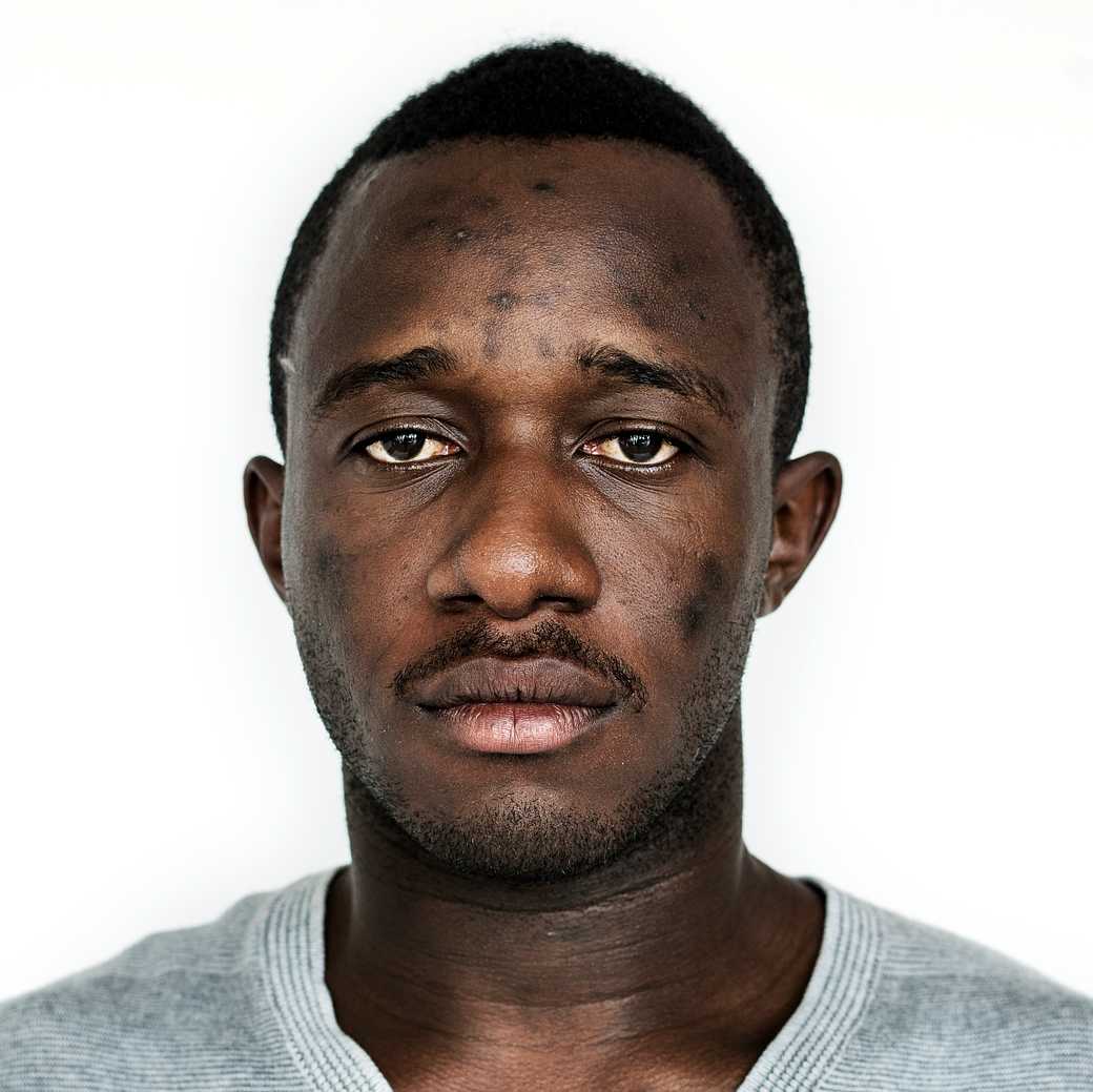 Portrait of a Ghanaian man Portrait of a Ghanaian man - adult, african, african descent, alone, beard, black, casual, closeup, expression, face, faces…