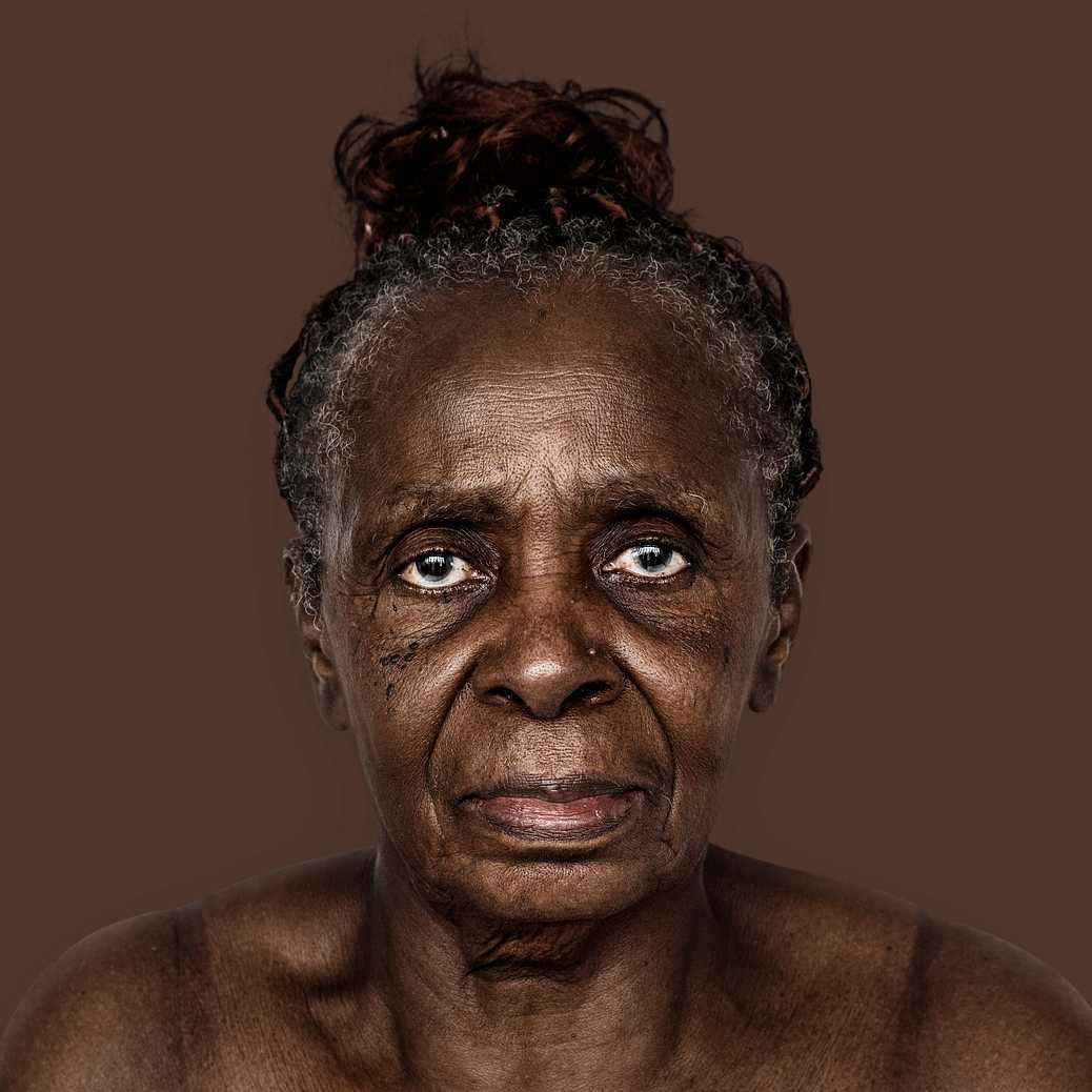 Portrait of a Congolese woman Portrait of a Congolese woman - adult, african, african descent, alone, black, central africa, cheerful, congo, congolese…