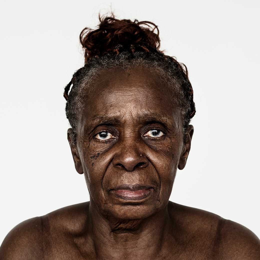 Portrait of a Congolese woman Portrait of a Congolese woman - adult, african, african descent, alone, black, central africa, cheerful, congo, congolese…