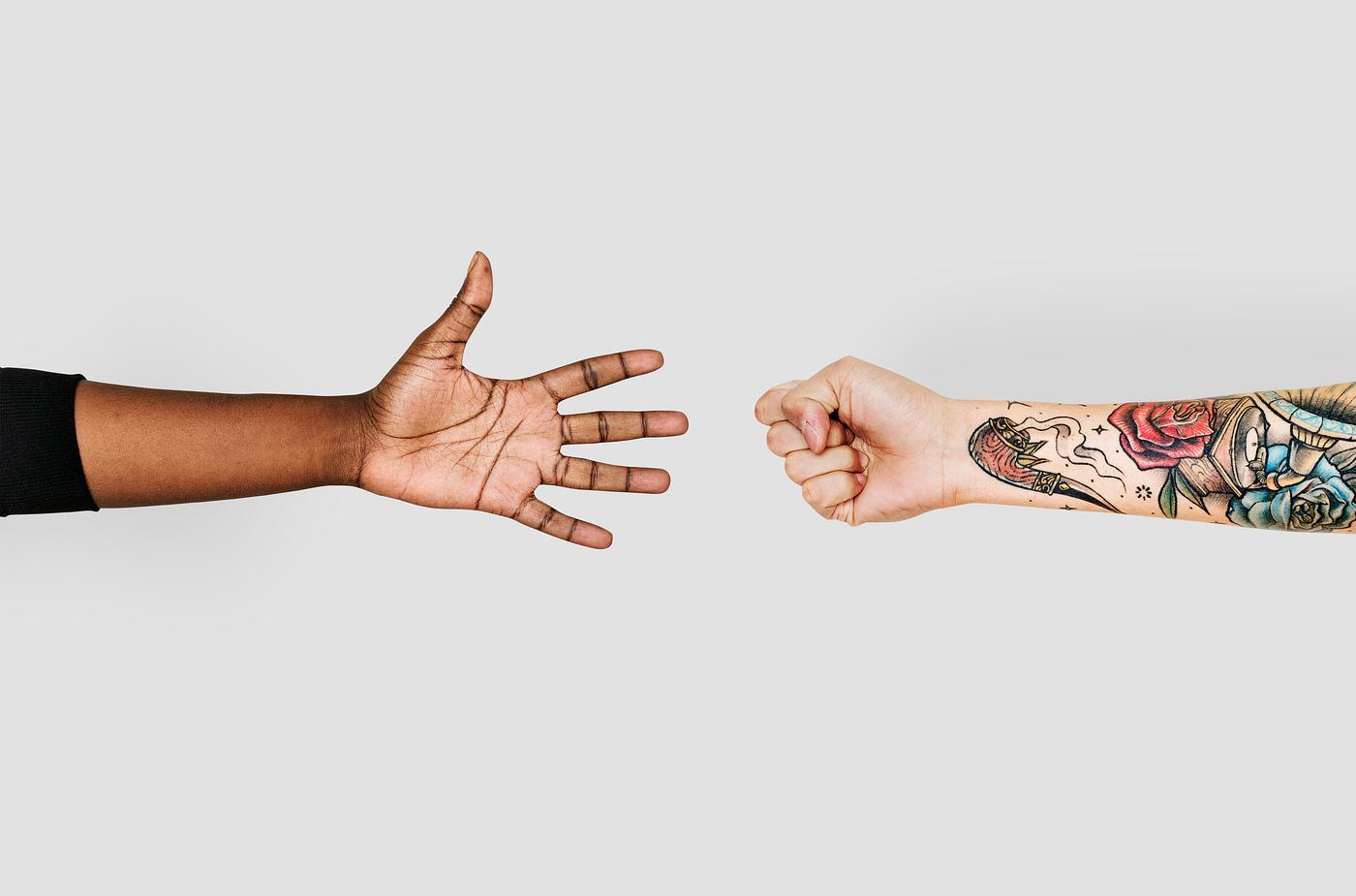 Hands playing rock-paper-scissors Hands playing rock-paper-scissors