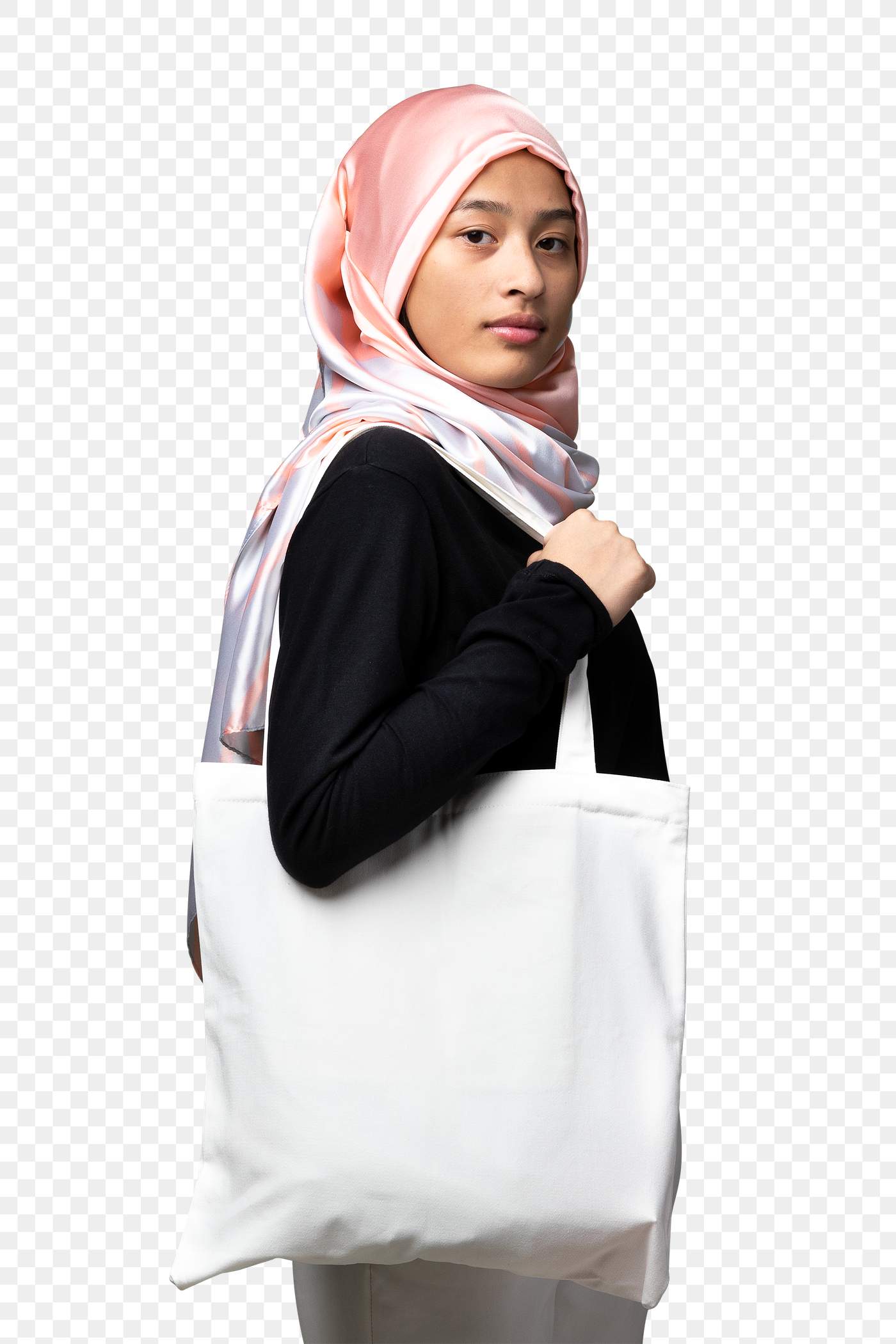 Download Canvas bag held by woman wearing hijab png | Free transparent png - 2210586