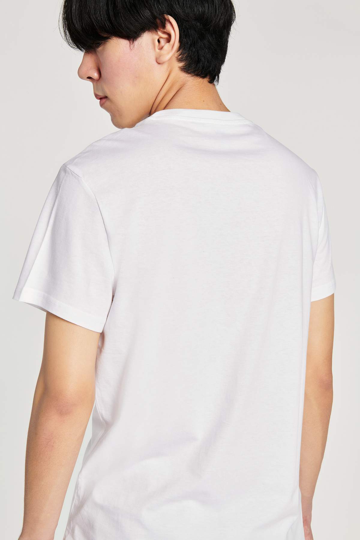 Download Asian Man In A White T Shirt Mockup Royalty Free Stock Photo High Resolution Image