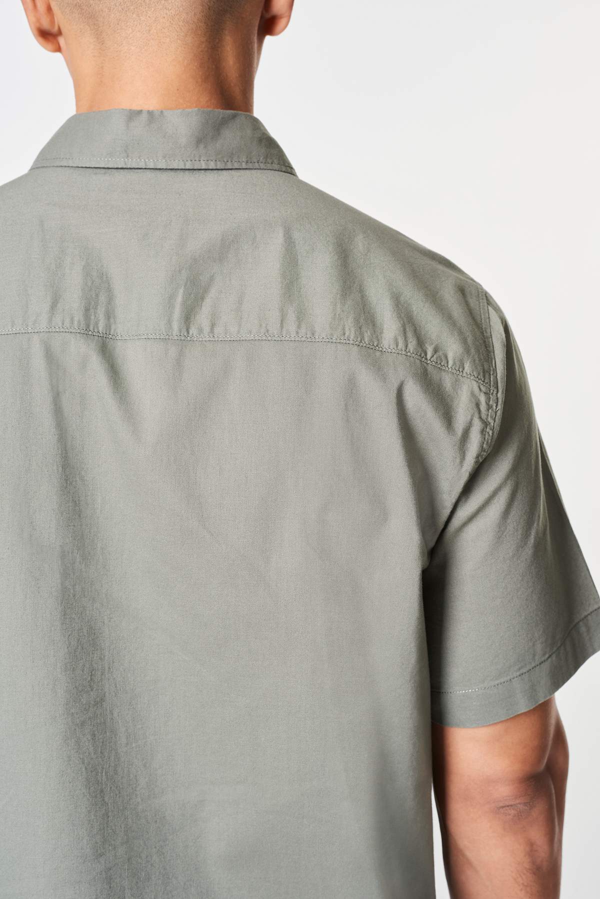 Man In A Gray Shirt Mockup Rear View