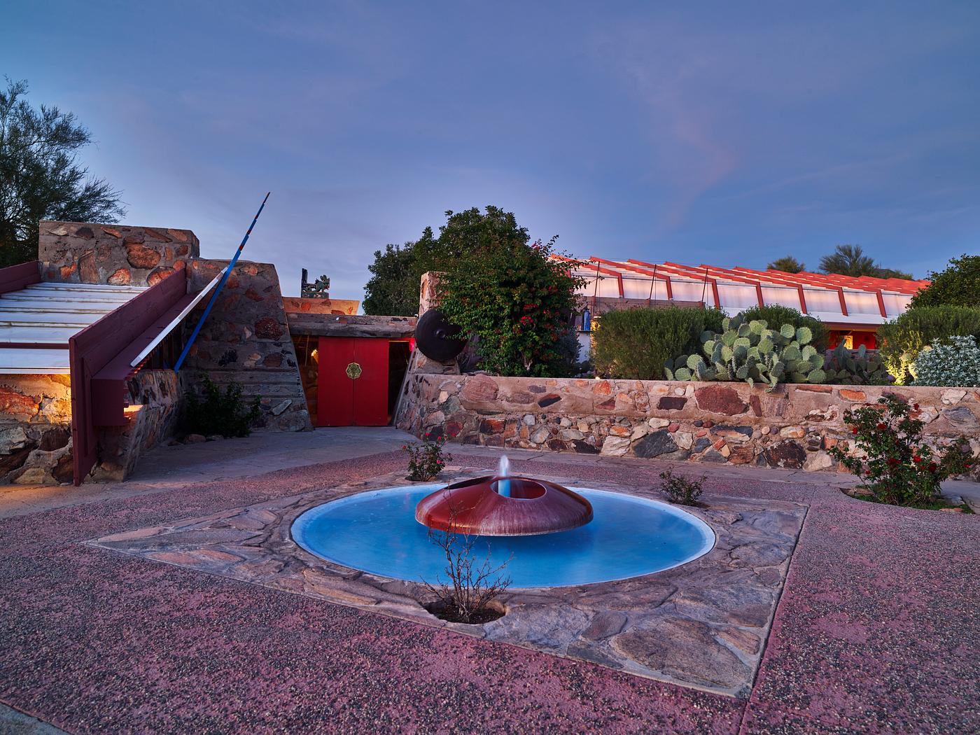 View of a fountain and the facility’s cabaret and music pavillion at Taliesin West, renowned architect Frank Lloyd... View of a fountain and the facility’s cabaret and music pavillion at Taliesin West, renowned architect Frank Lloyd...