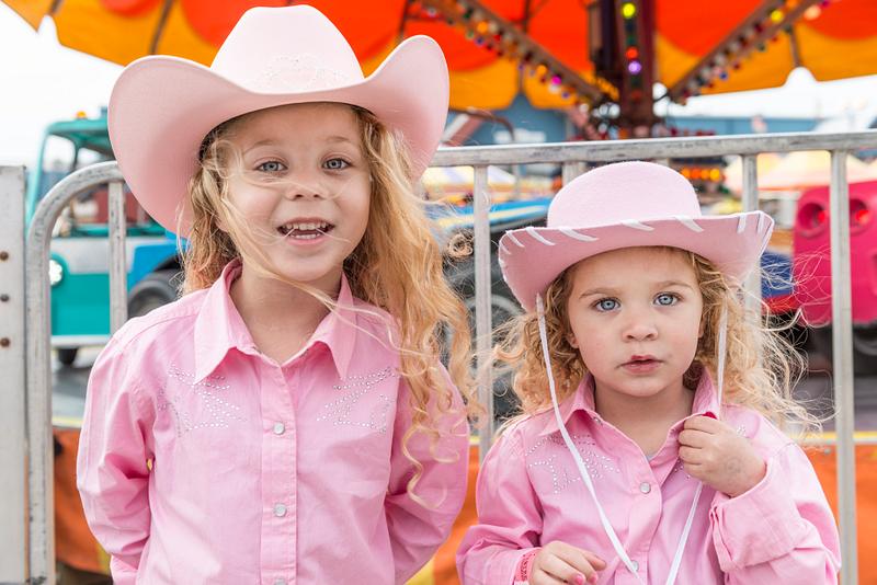 Carol M. Highsmith’s Texas Photograph Samantha and Scarlett Santana have some fun in the ride area of a carnival outside the event locations Rodeo Austin, the…