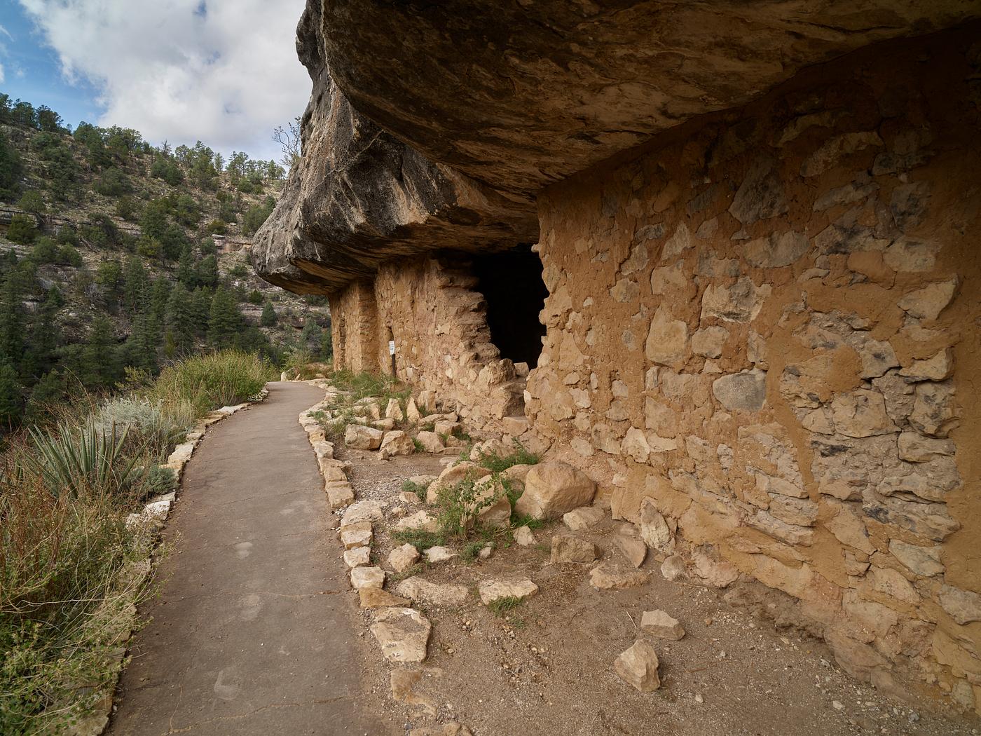 Pre-Columbian peoples used these ledges as protection from rain and snow in Walnut Canyon National Monument, located about... Pre-Columbian peoples used these ledges as protection from rain and snow in Walnut Canyon National Monument, located about...